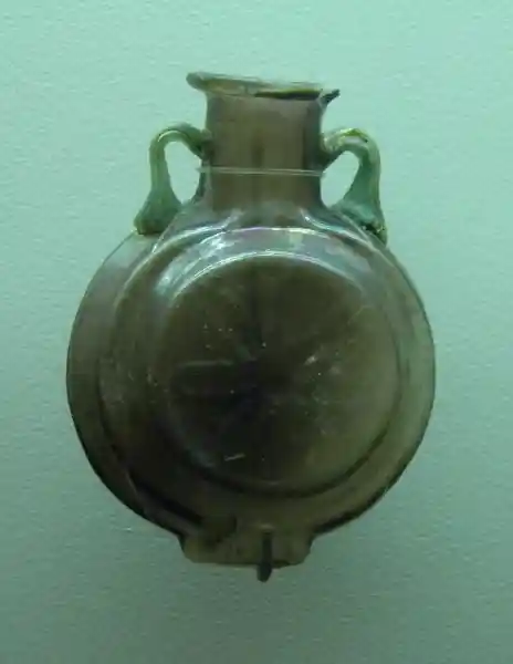 Glass vase with a six-pointed flower-like cross design